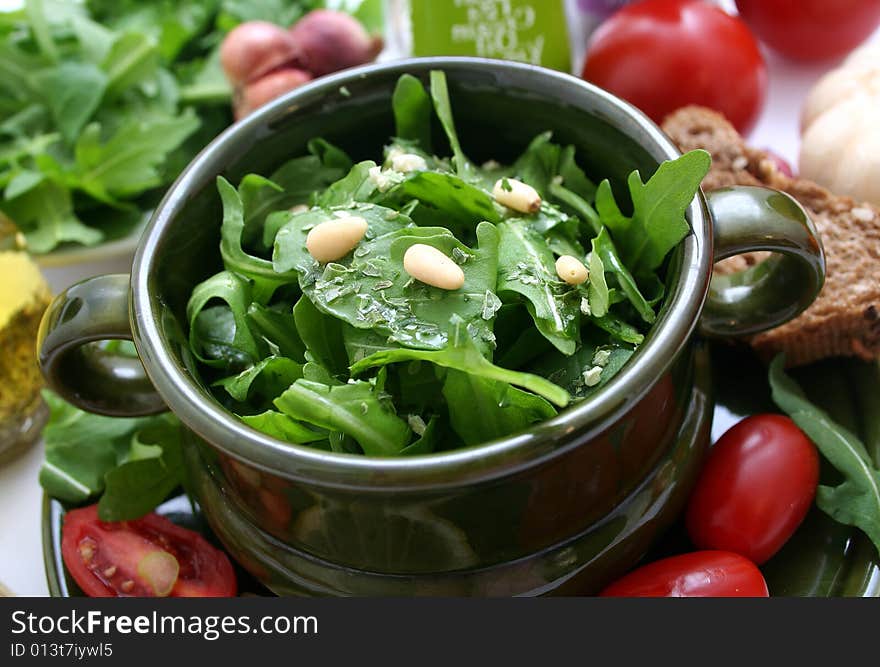 Rucola with pine corns