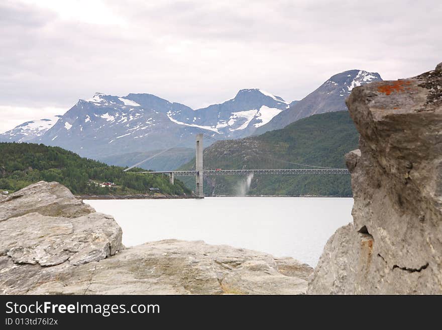 Norway landscape, fjord and mountains in the background