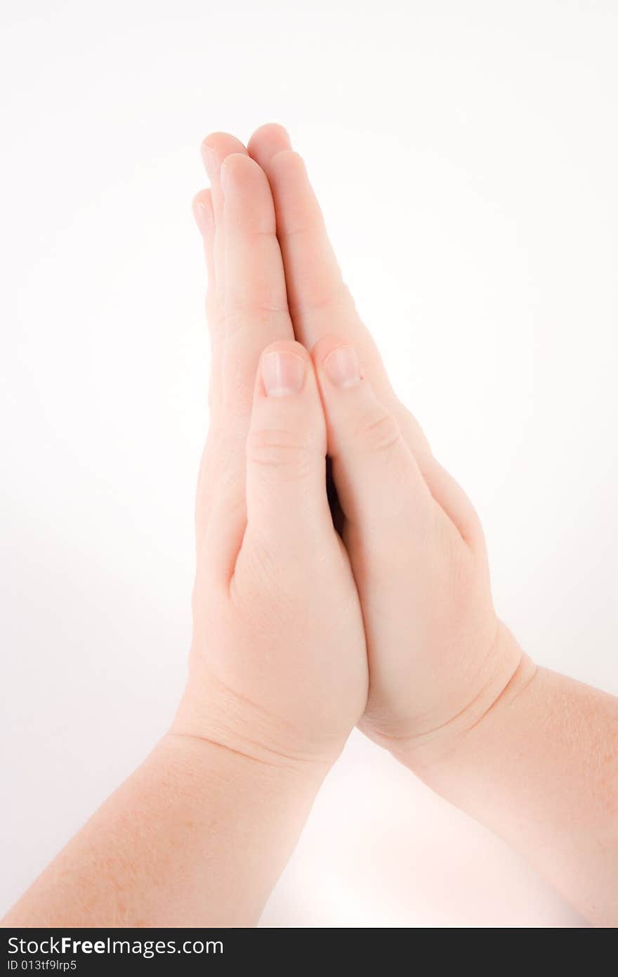 Woman's hands clasped or folded in prayer