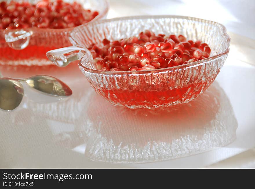 Close-up of dessert with pomegranate and red jelly