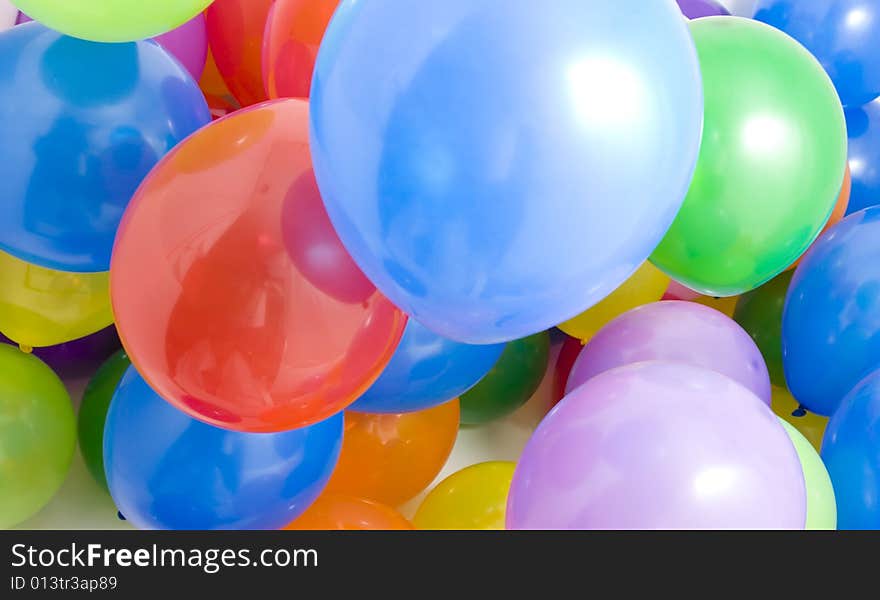 Many multicolored balloons suitable for a background. Many multicolored balloons suitable for a background