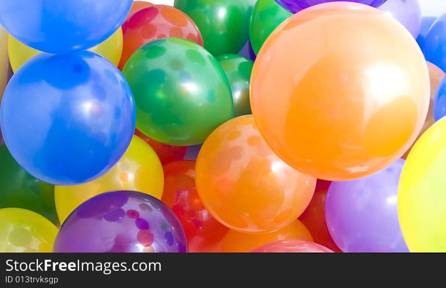 Many multicolored balloons suitable for background. Many multicolored balloons suitable for background