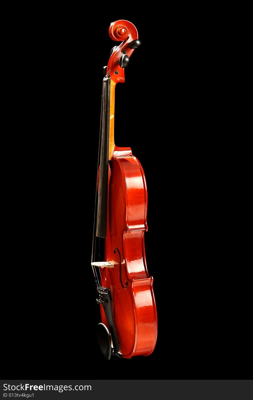 Violin, isolated on black background. Violin, isolated on black background