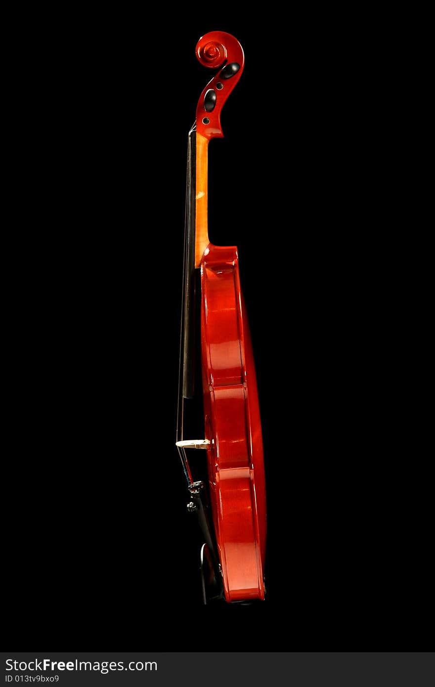 Violin, isolated on black background. Violin, isolated on black background