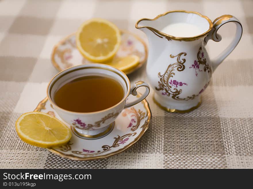 Tea with lemon and milk