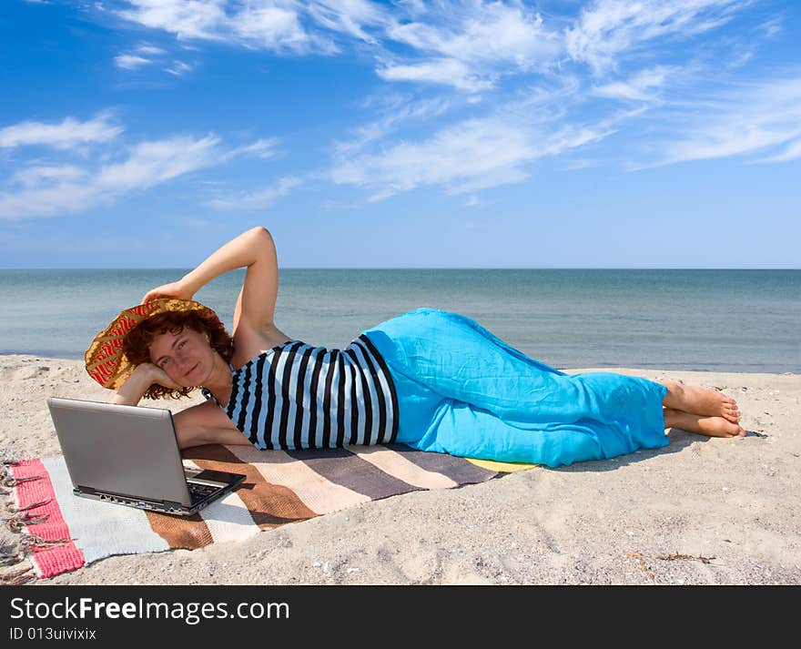 Woman With Laptop At Seaside