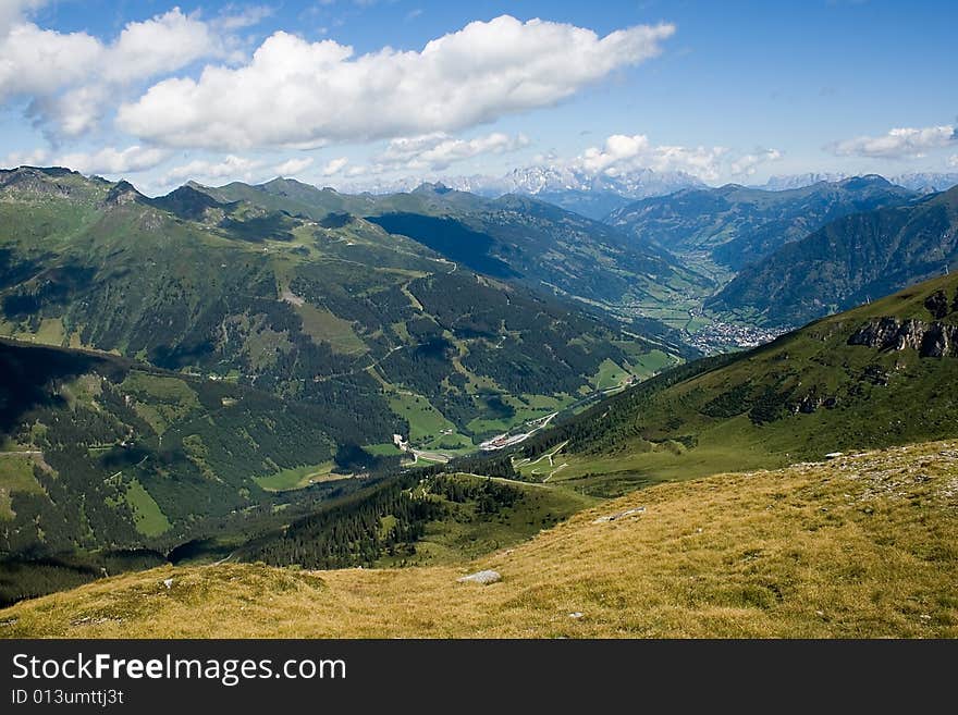 Nice background with mountains, white clouds and blue sky. Nice background with mountains, white clouds and blue sky.