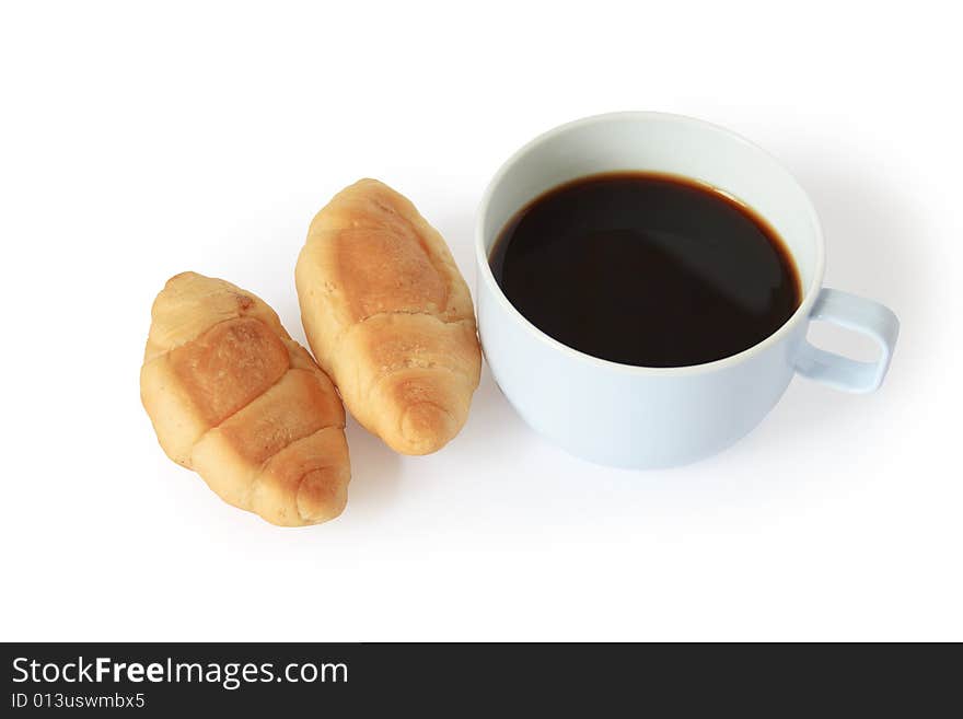 Two fresh croissants and cup of black coffee on white background. Two fresh croissants and cup of black coffee on white background