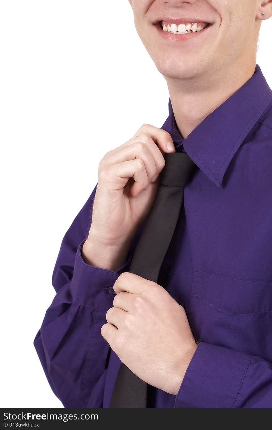 Businessman fixing his tie