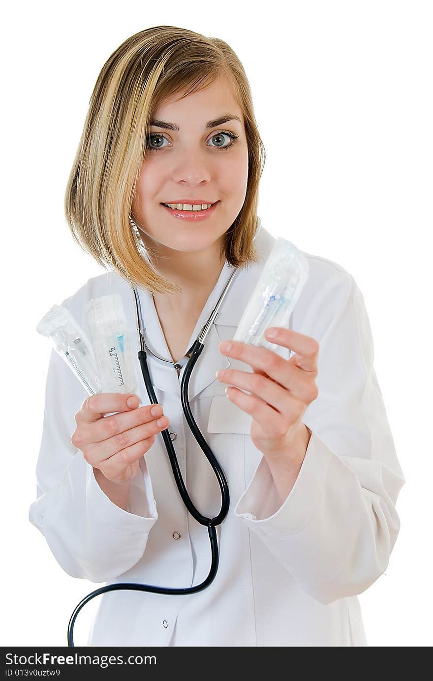 Young nurse with non-permanent syringes on white