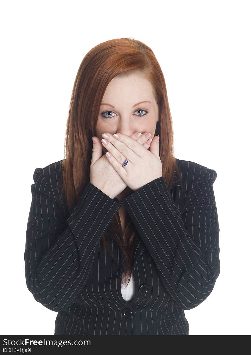 Isolated studio shot of a businesswoman in the Speak No Evil pose. Isolated studio shot of a businesswoman in the Speak No Evil pose.