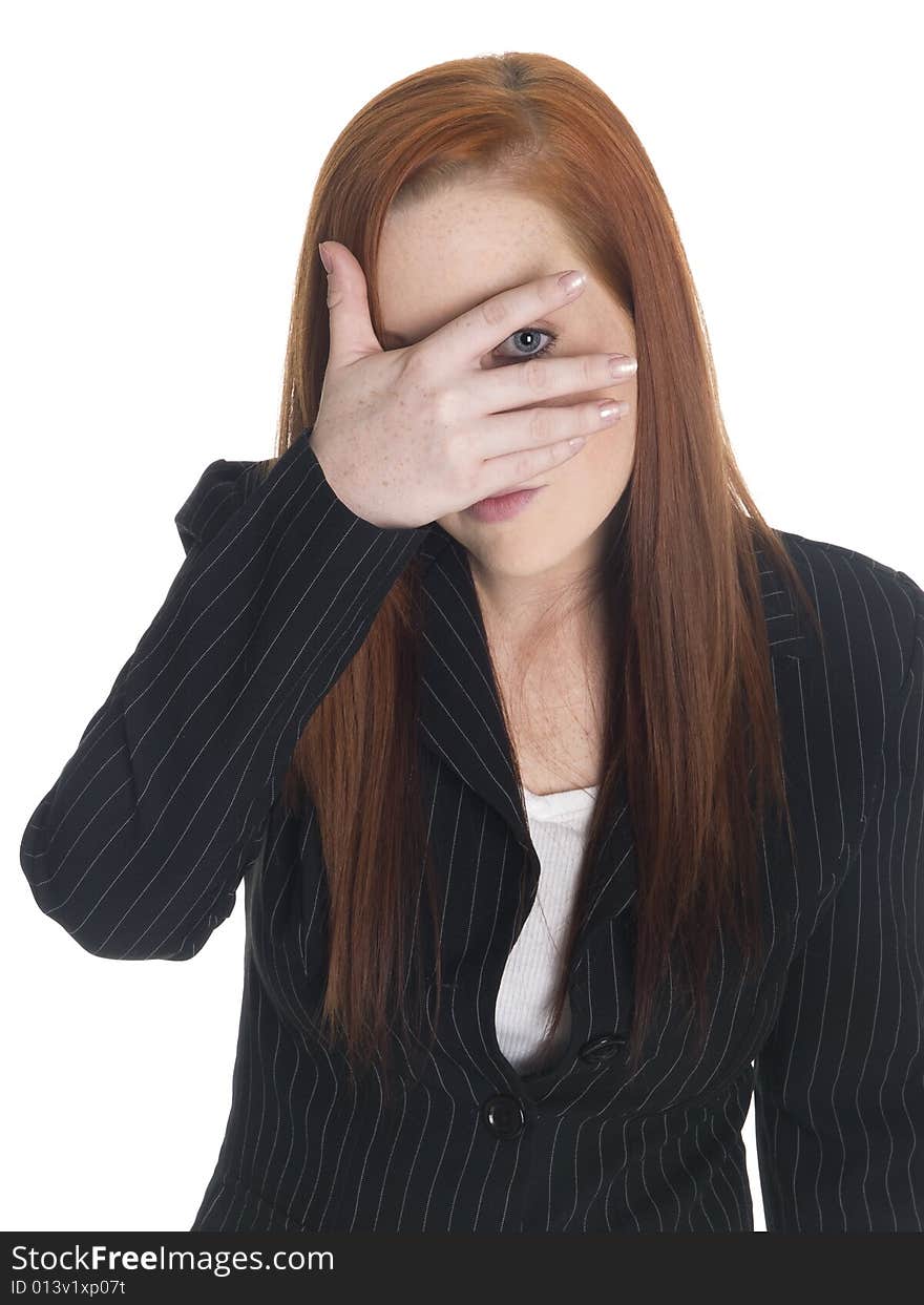 Isolated studio shot of a businesswoman who is peeking even though she just can't look. Isolated studio shot of a businesswoman who is peeking even though she just can't look.