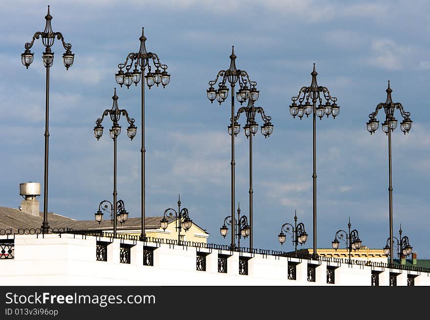 Tall lanterns in the street, summer. Tall lanterns in the street, summer.