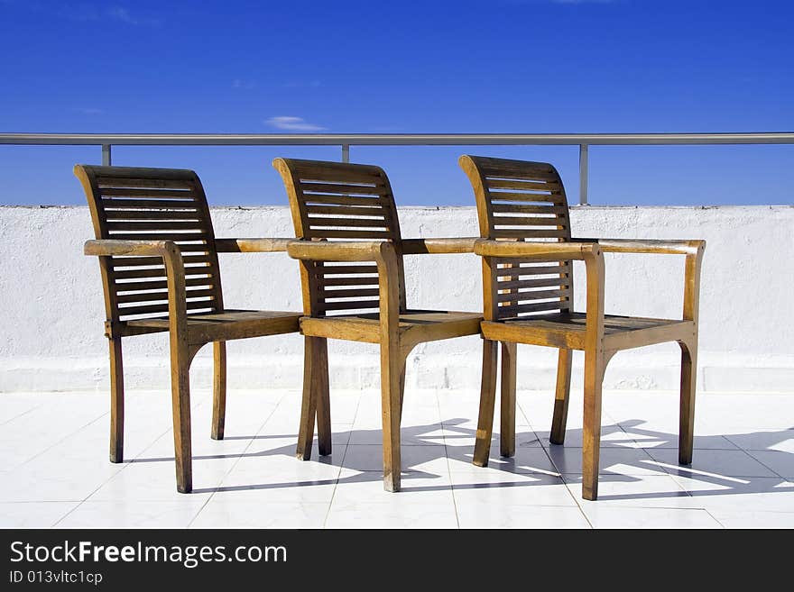 Three chair on balcony