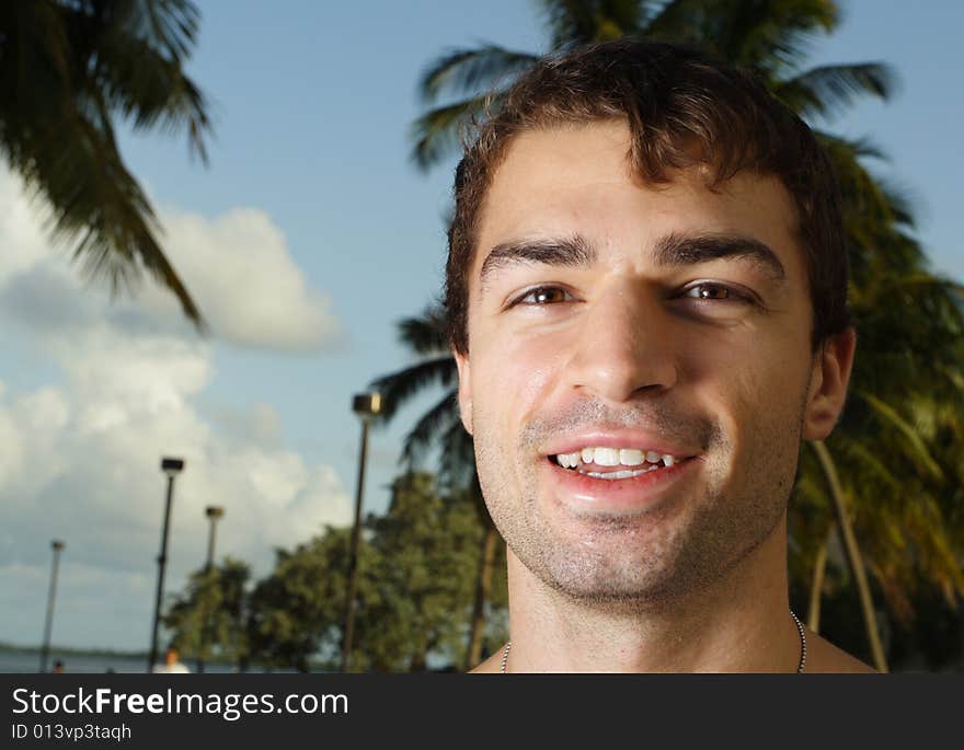 Young man in a tropical scene. Young man in a tropical scene