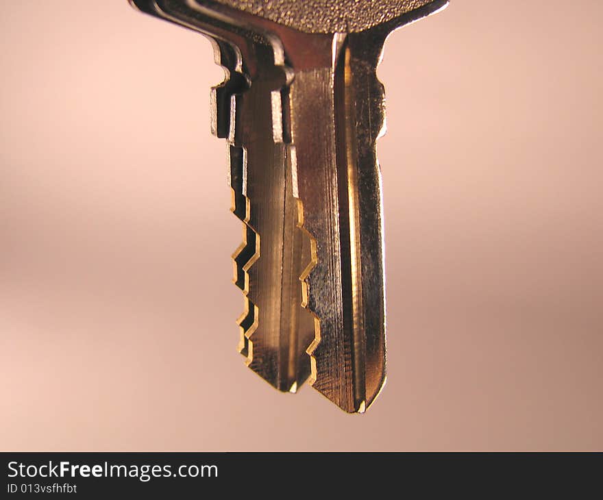 Three keys on a color background