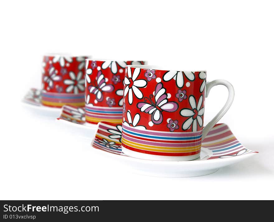 Bright cups of black coffee isolated on the white