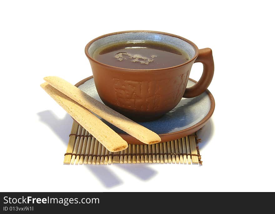 Ceramic cup and cookies