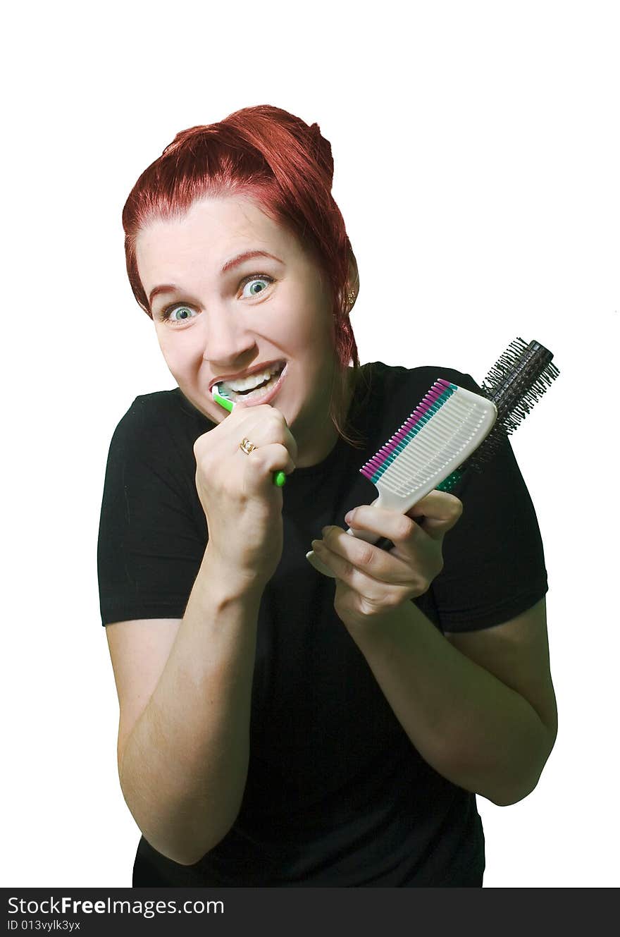 Funny woman with combs on white background.