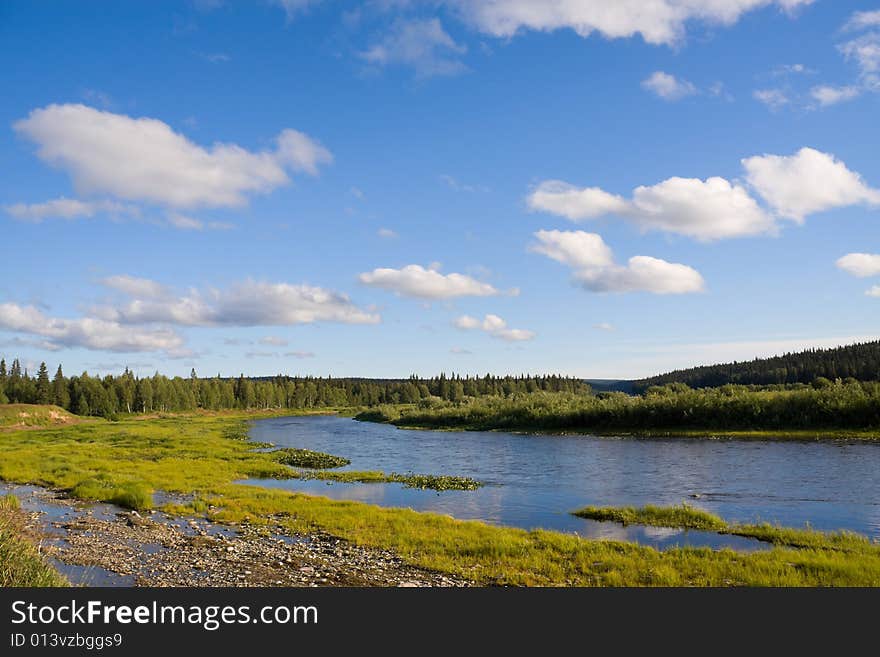 Landscape with river and clouds