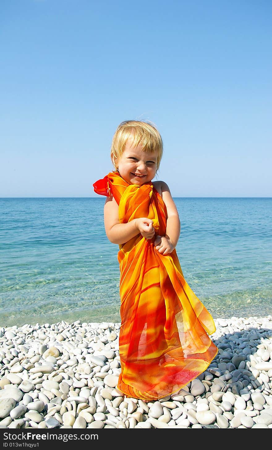 Cute little girl on seacoast