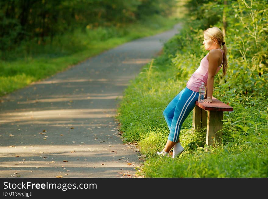 Pretty young girl runner in the forest. Pretty young girl runner in the forest.