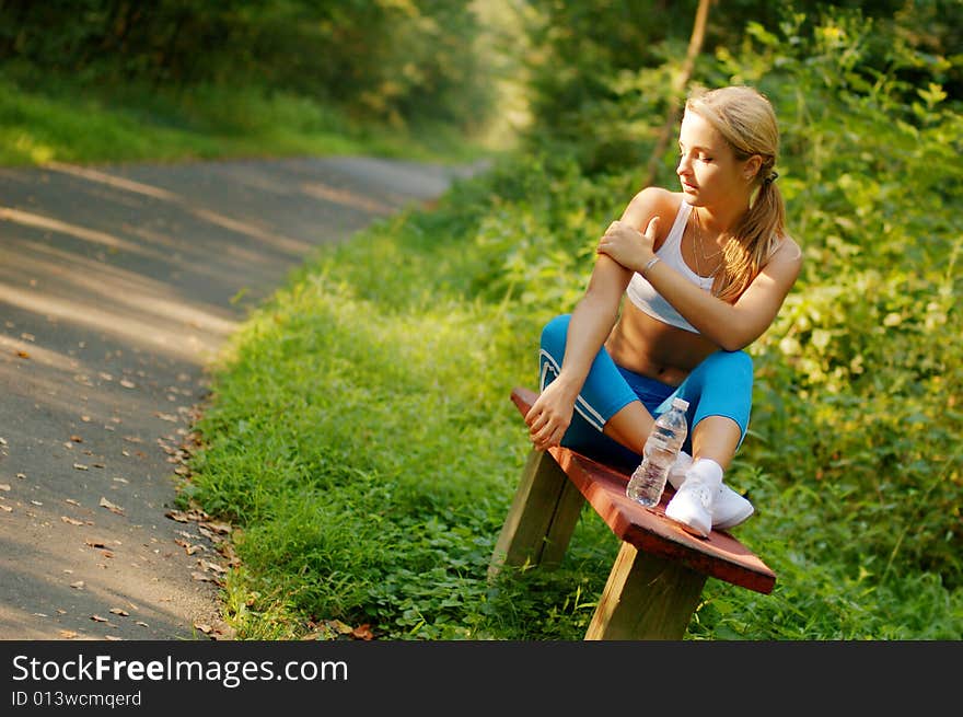 Pretty young girl runner in the forest. Pretty young girl runner in the forest.