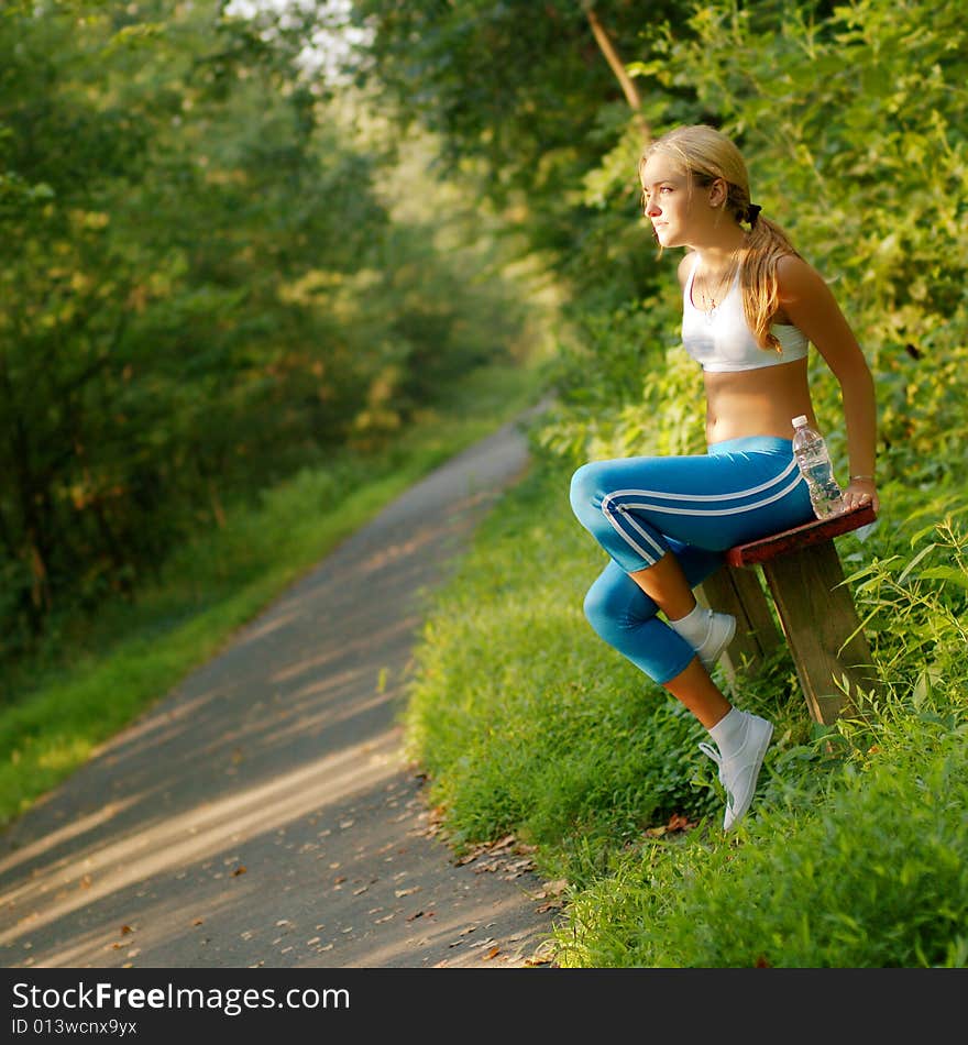 Pretty young girl runner in the forest. Pretty young girl runner in the forest.