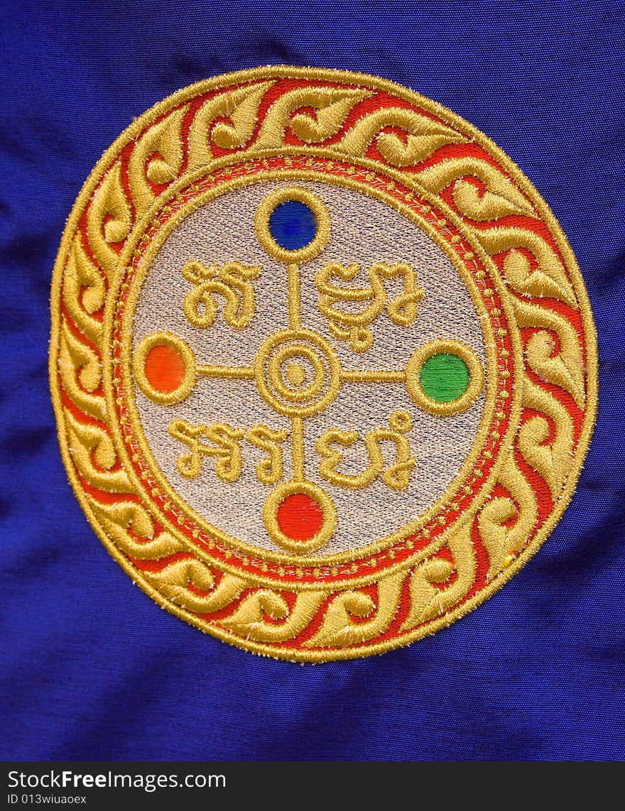 Religous Buddhist monk spiritual emblem on fabric. Religous Buddhist monk spiritual emblem on fabric