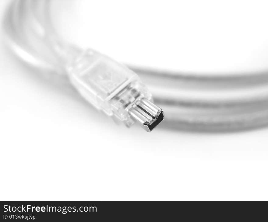 Transparent firewire cable isolated over white background