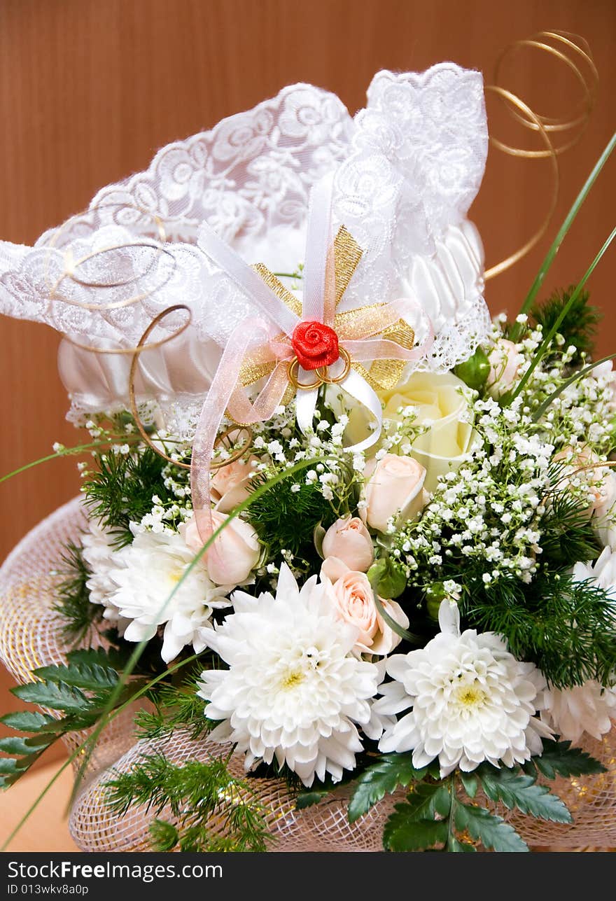 White garter on the wedding bouquet