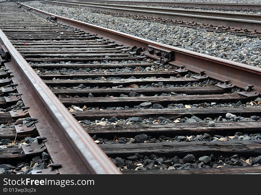 A close up of a row of railroad tracks