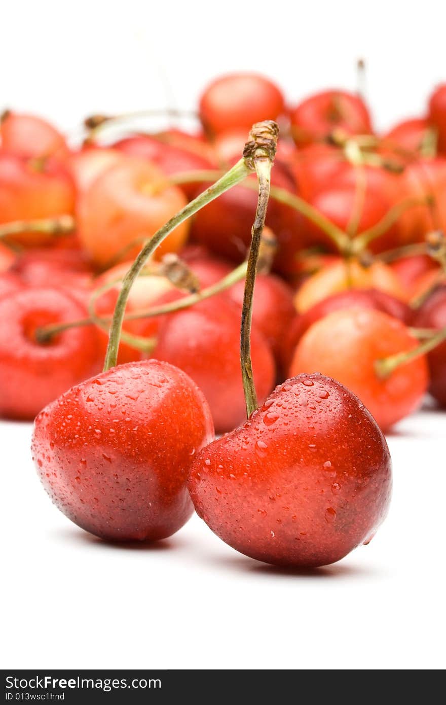 Fresh appetizing sweet cherry on a white background. Fresh appetizing sweet cherry on a white background