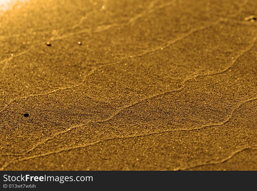 Wet send in perspective on the beach. Wet send in perspective on the beach