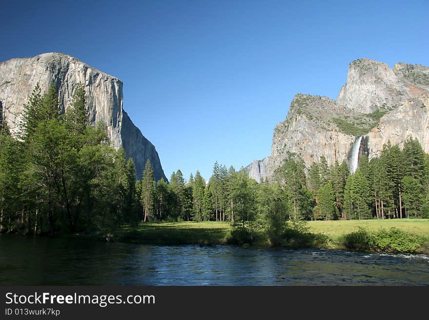 Famous natural landmark destination El Capitan, one of the magnificent mountains in Yosemite. Yosemite national park. California. USA. Famous natural landmark destination El Capitan, one of the magnificent mountains in Yosemite. Yosemite national park. California. USA