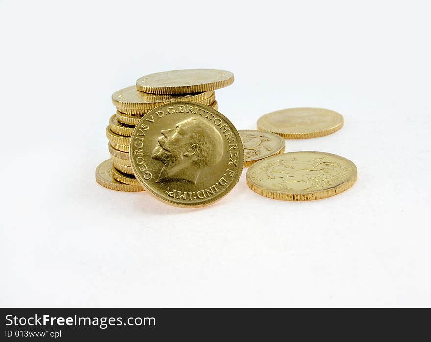 Gold Coins On A Whitek Background