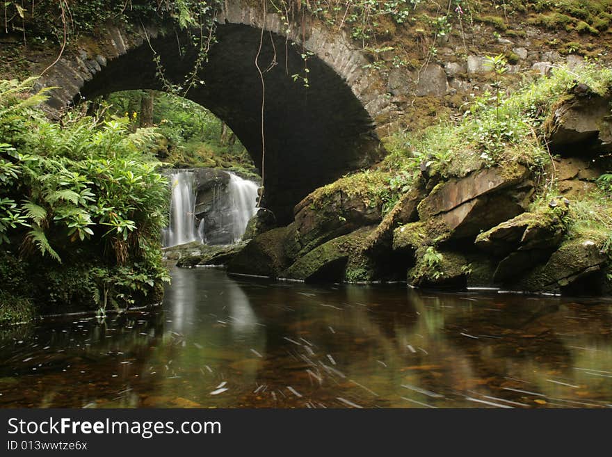 Scenic small bridge with beautiful stream underneath in county Kerry, Ireland. Scenic small bridge with beautiful stream underneath in county Kerry, Ireland