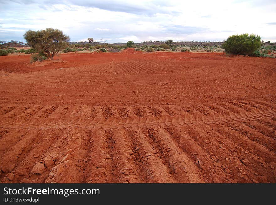 Background with tire prints on earth