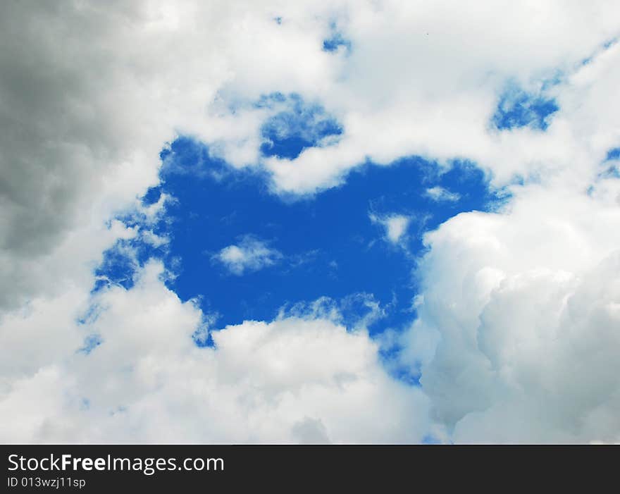 The sky and the clouds looking as a window. Russia, Summer 2008.