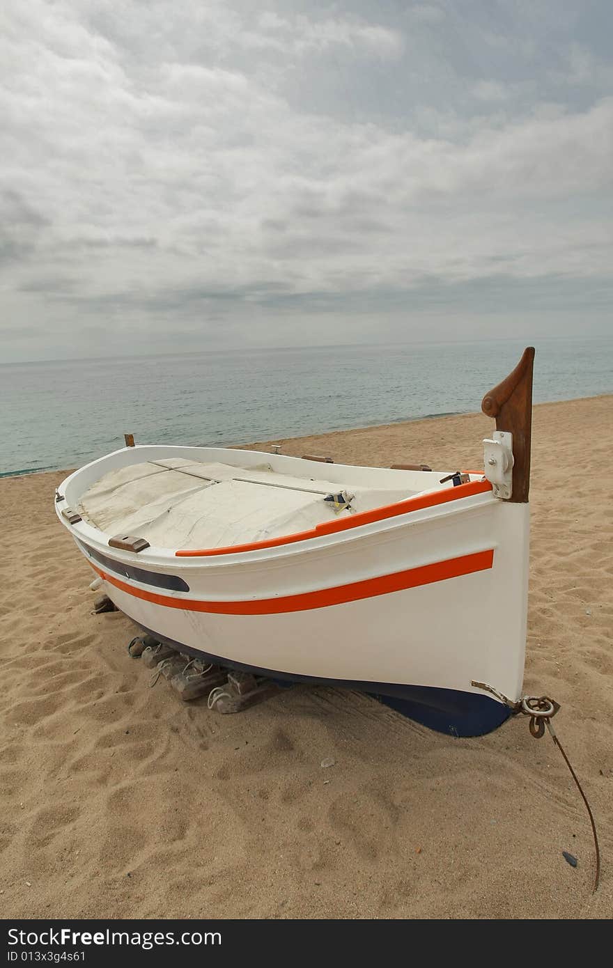 Fishing boat docked by the beach