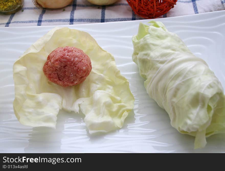 Preparing a meal of meat and vegetables. Preparing a meal of meat and vegetables