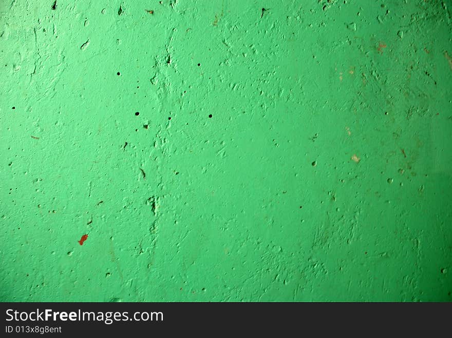 Green old paint texture wall with scratches. Green old paint texture wall with scratches