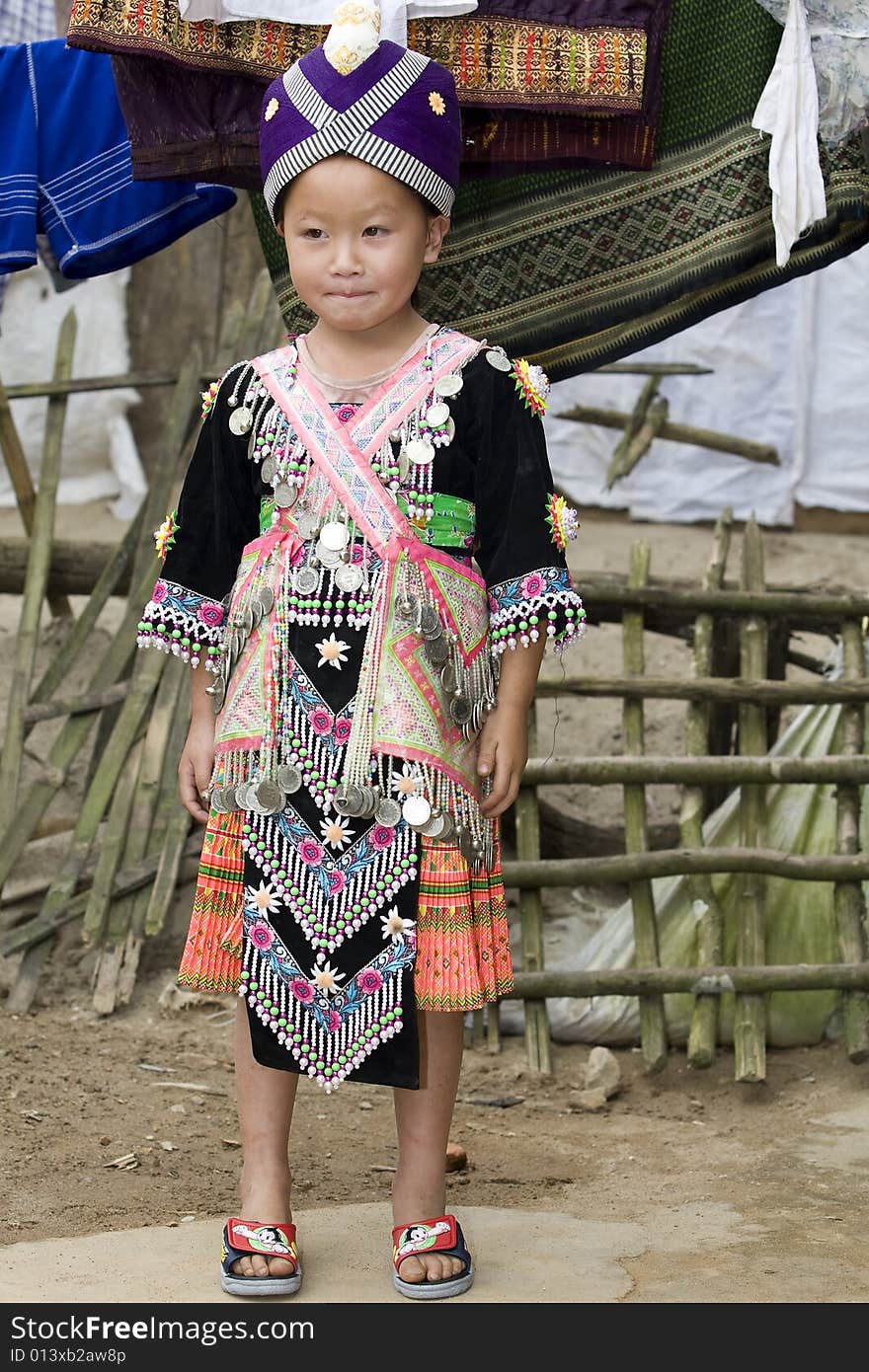 Laos Hmong girl in traditional clothes in the surroundings of Luang Prabang