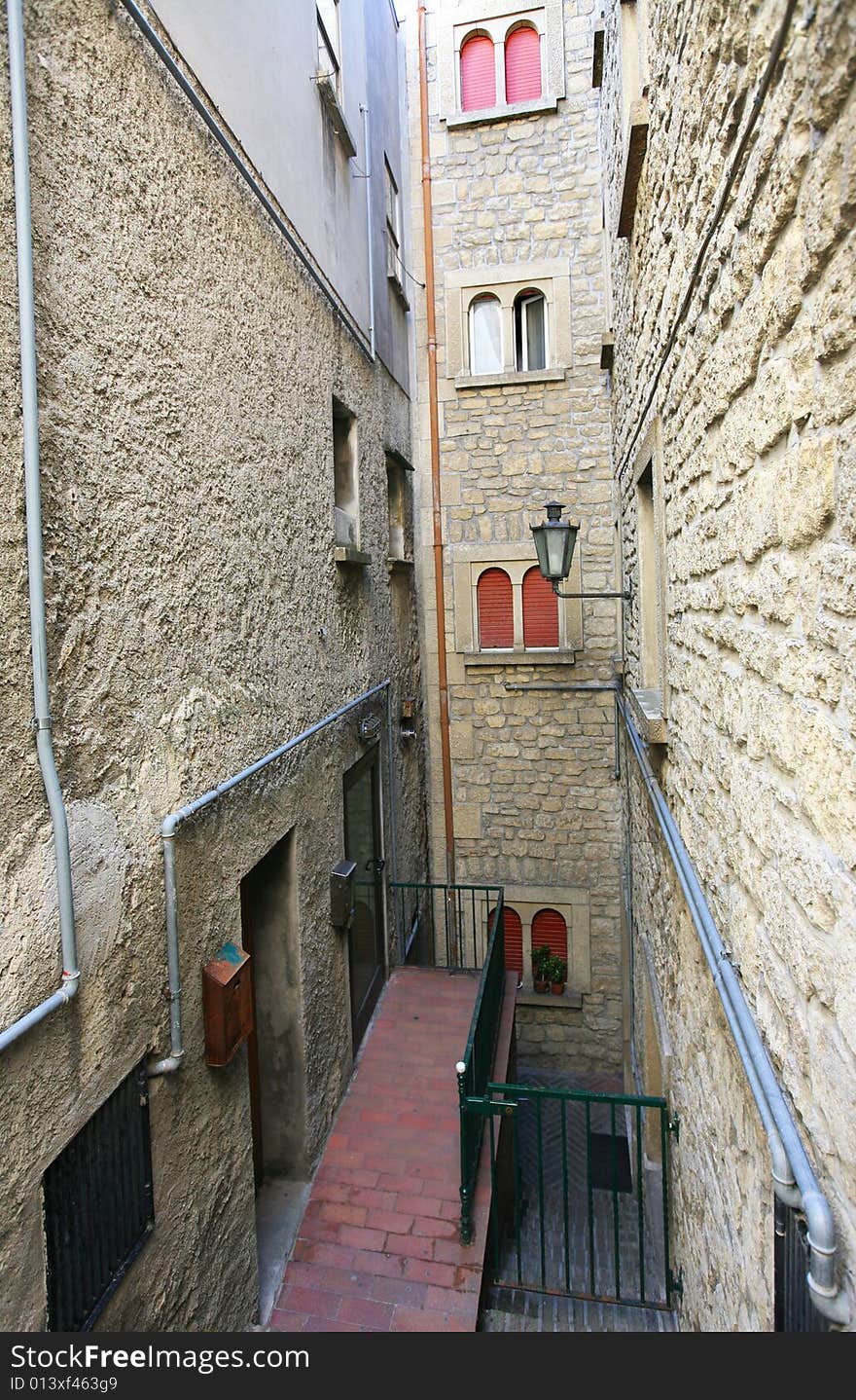 Old Italian street with typical windows