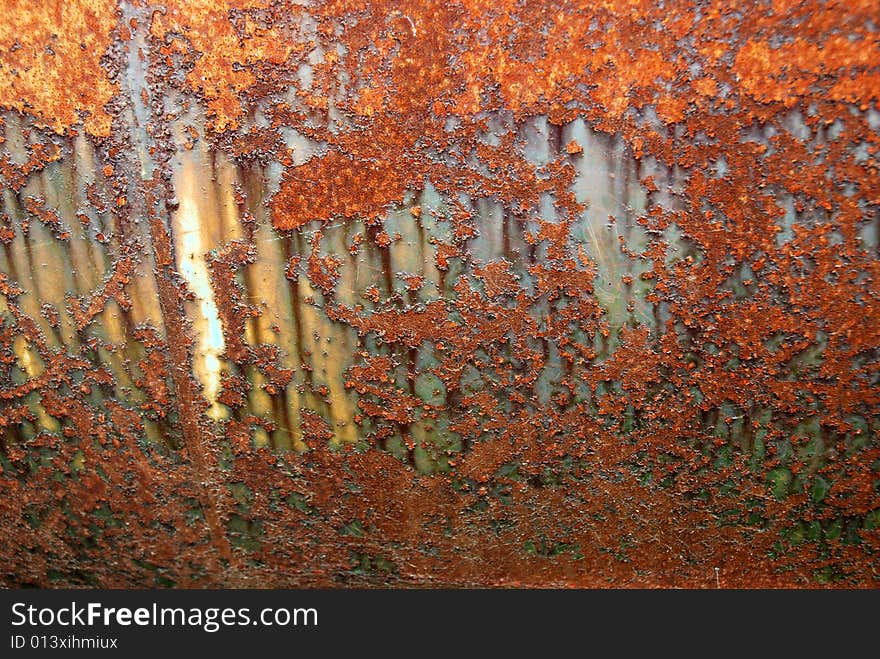 Abstract pattern of rust forming on iron surface. Abstract pattern of rust forming on iron surface