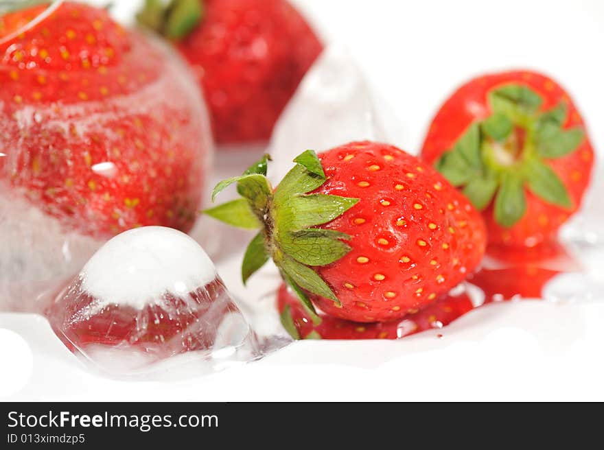 An image of fresh frozen strawberries. An image of fresh frozen strawberries