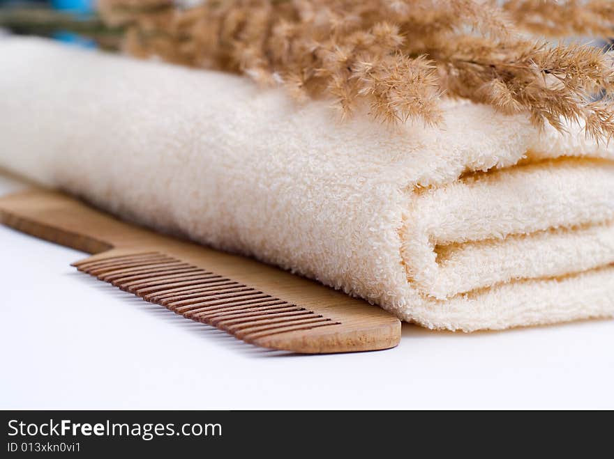 Bath background with towel, sponge and herb