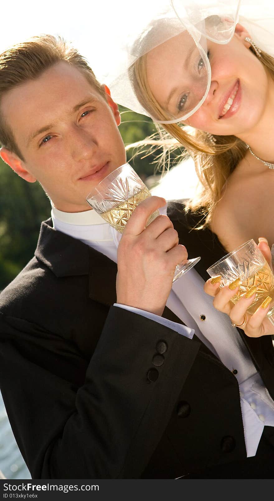 Bride and groom with champagne. Bride and groom with champagne