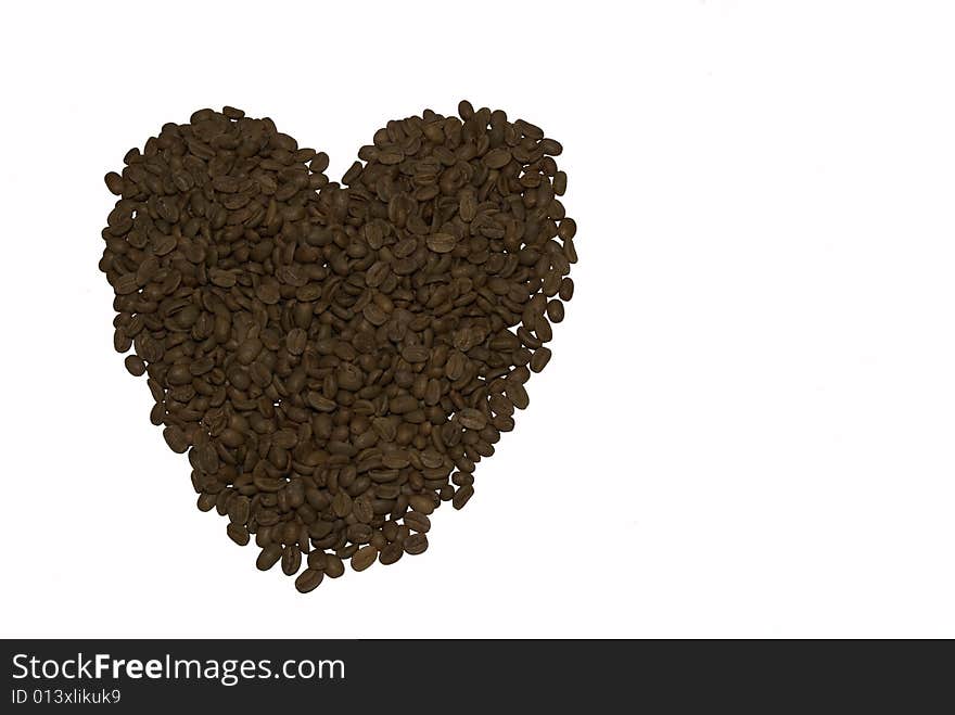 Heart from brown grains of coffee. Heart from brown grains of coffee