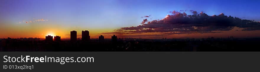 Panoramic an evening city on roof. Panoramic an evening city on roof